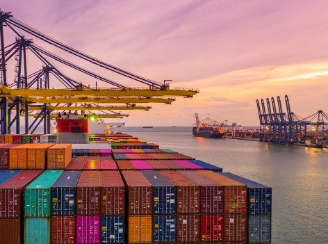 cropped-container-ship-loading-unloading-deep-sea-port-sunset-aerial-view-business-logistic-import-export_35024-744-3.jpg